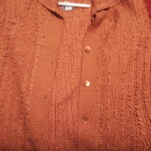 2-oiece sleeveless top and long sleeved jacket